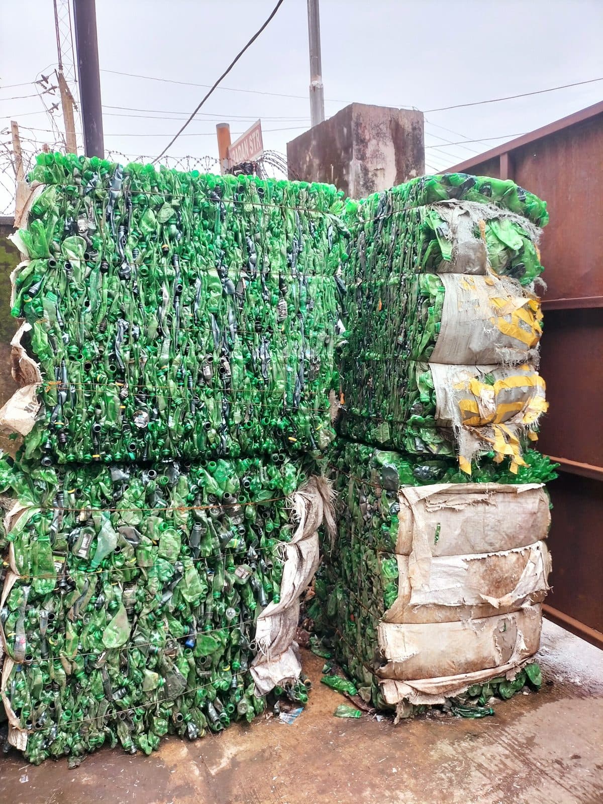 Bales of compressed plastic bottles ready for recycling